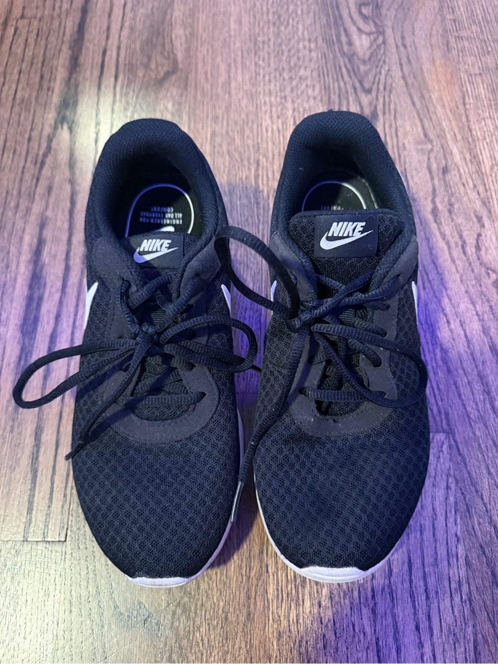 Black and white Nike running sneakers
